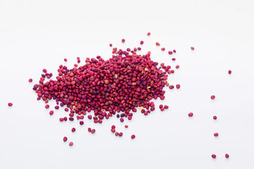 photo of many, tiny, red daikon seeds - shutterstock