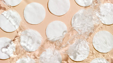 stock photo of cotton rounds having liquid splashed on them